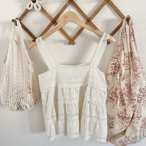 Textured tiered cream tank